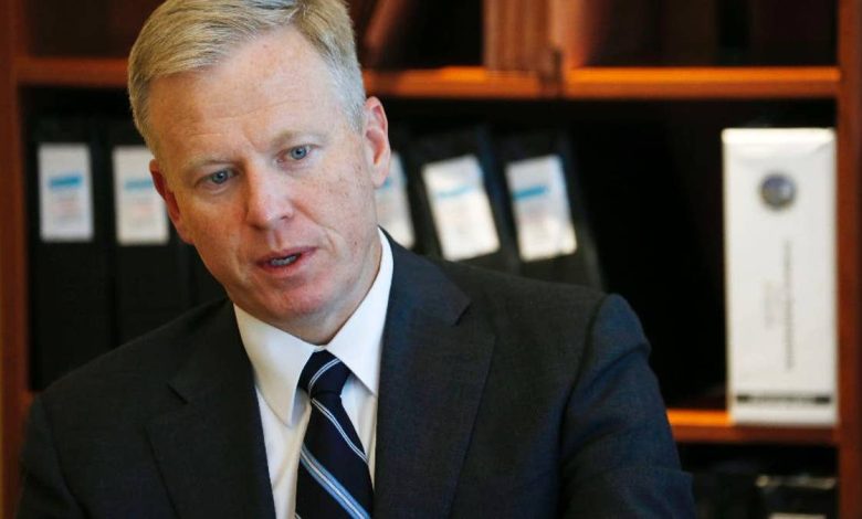 George Brauchler, lead prosecutor in the case against convicted Colorado theater shooter James Holmes, responds to questions during an interview Friday, Aug. 14, 2015, in Centennial, Colo. Brauchler said that the jury's refusal to sentence Holmes to die for one of the worst massacres in the country's history does not mean the public is growing wary of capital punishment because only a single juror blocked the execution. (AP Photo/David Zalubowski)