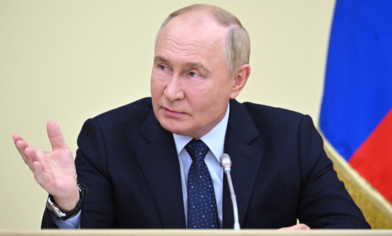 In this pool photograph distributed by Russian state owned Sputnik agency President Vladimir Putin chairs a meeting with Russian Government members at the Novo-Ogaryovo residence, on August 7, 2024