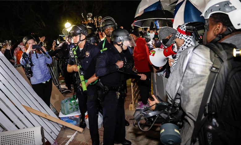 Police officers, protesters