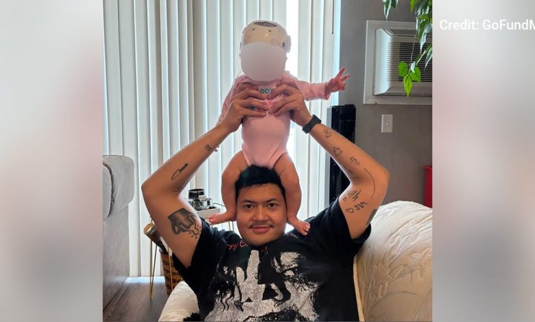 Aditya Harsono with infant