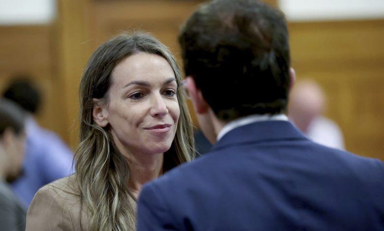 Defendant Karen Read, left, confers with defense lawyer Robert Alessi in court