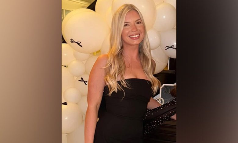Ashlee Long in a strapless black dress