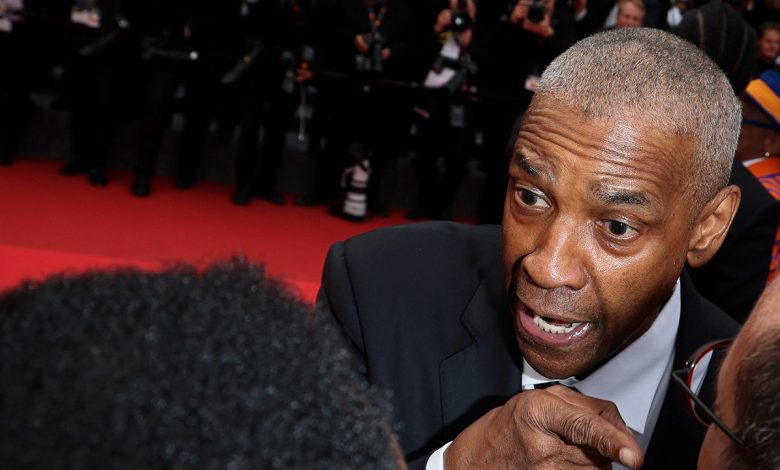 Denzel Washington denies leaving Cannes early after red carpet confrontation