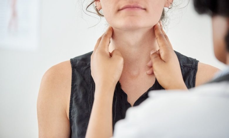 Woman throat exam