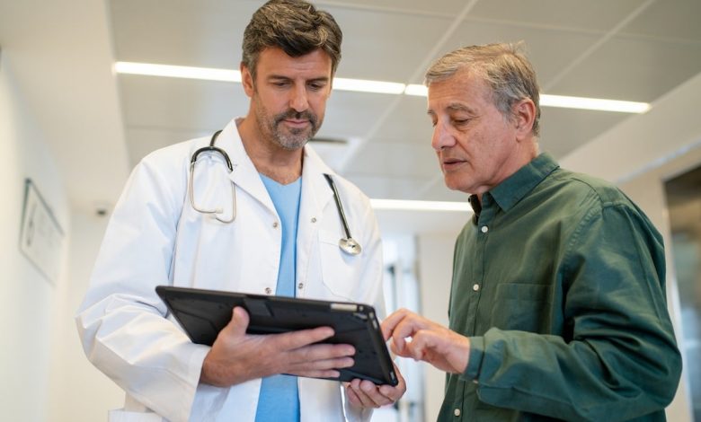 Man talking to doctor