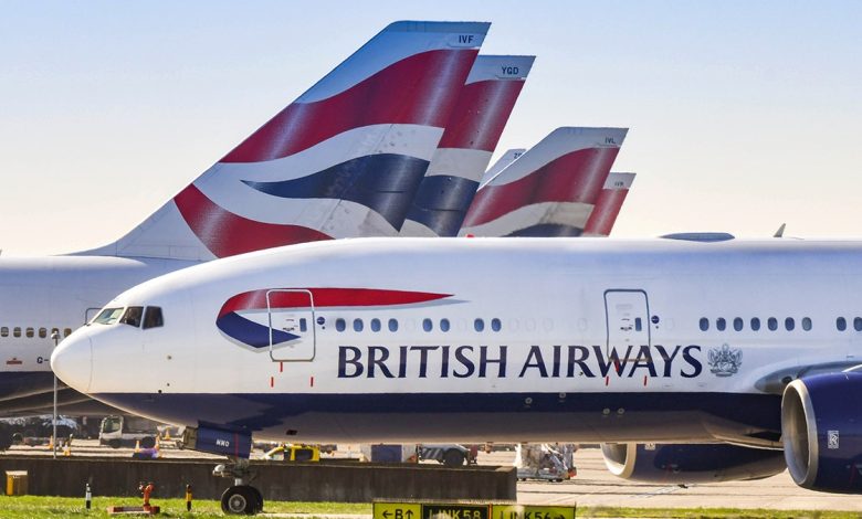 British Airways Boeing 777 taxiing for take off, surrounded by other planes