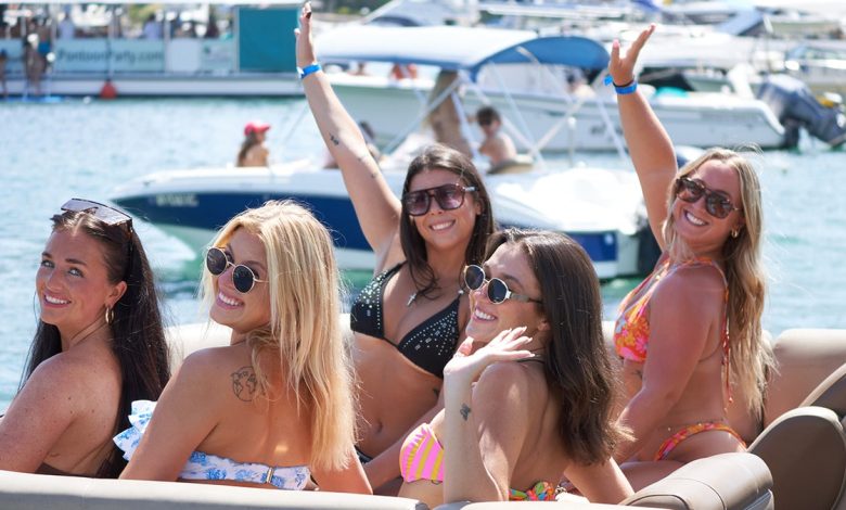 PHOTOS: Florida Boca Bash revelers take over lake for boozy, bikini-clad boat party