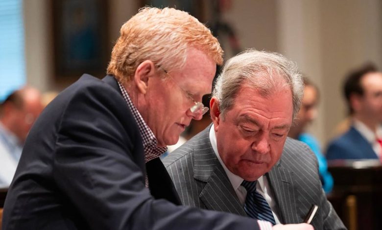 Alex Murdaugh and Dick Harpootlian sit together during Murdaugh's 2023 murder trial