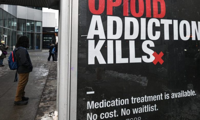 A sign warning about the dangers of opioid promoting medically-assisted treatment