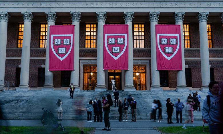 Harvard University banners hang in May 2025
