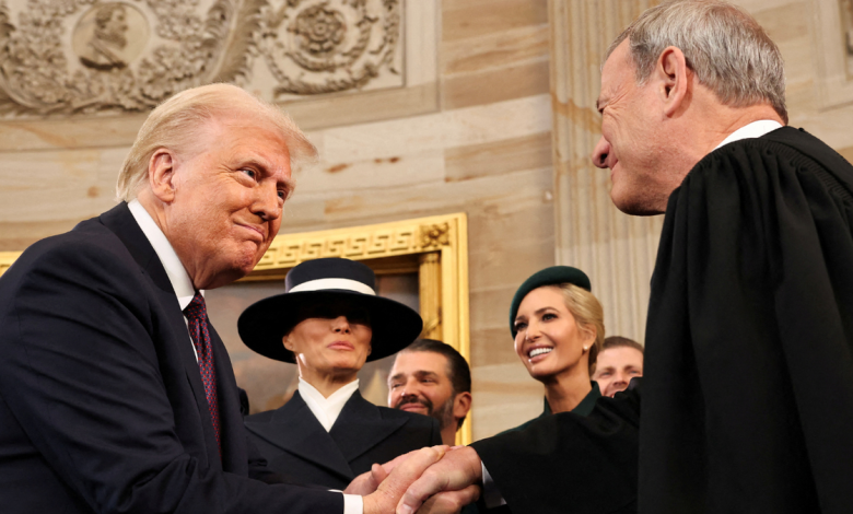 President Trump shaking Chief Justice Roberts' hand