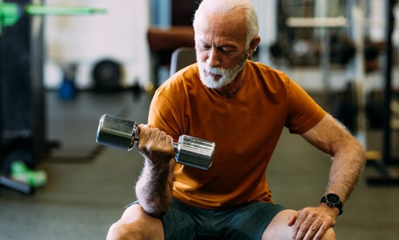 Older man lifting weights