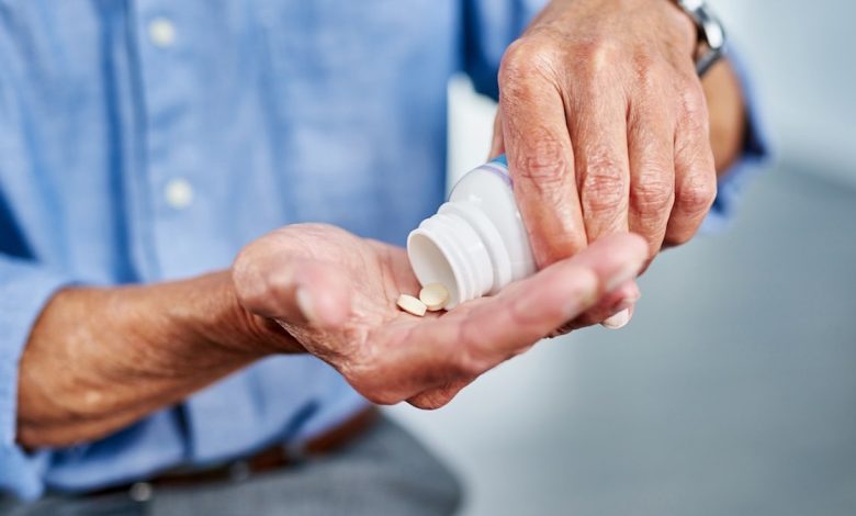 Man taking pills