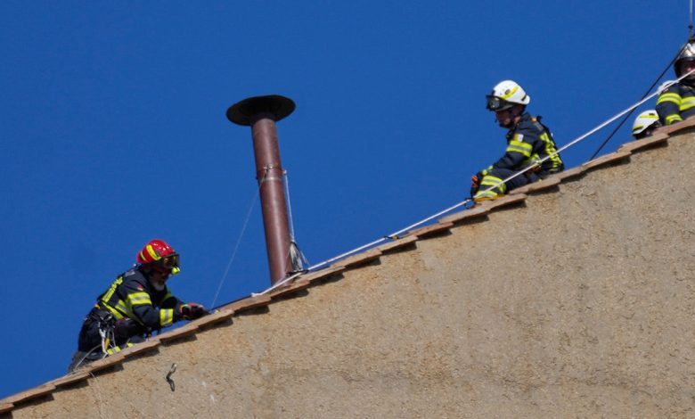 Chimney installed on Sistine Chapel's roof ahead of Vatican conclave