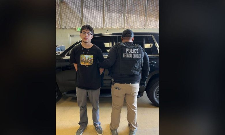 Gibram Torres, 22, pictured with an ICE agent
