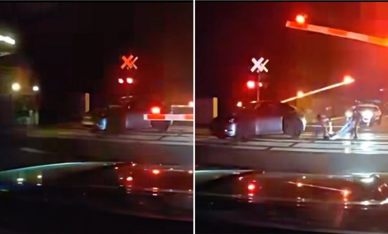 Piscataway Township Police Department officer save a man from an oncoming train