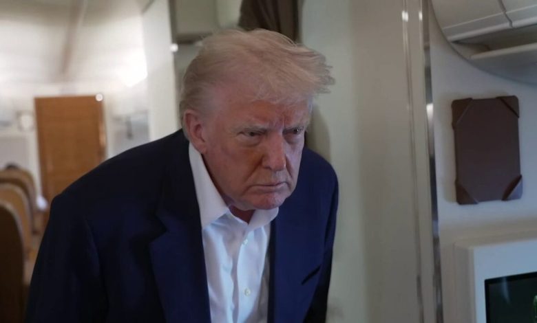 Trump speaks to reporters on Air Force One