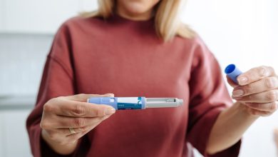Woman holding injectable