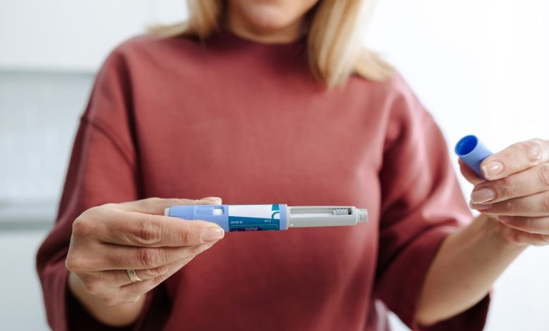Woman holding injectable