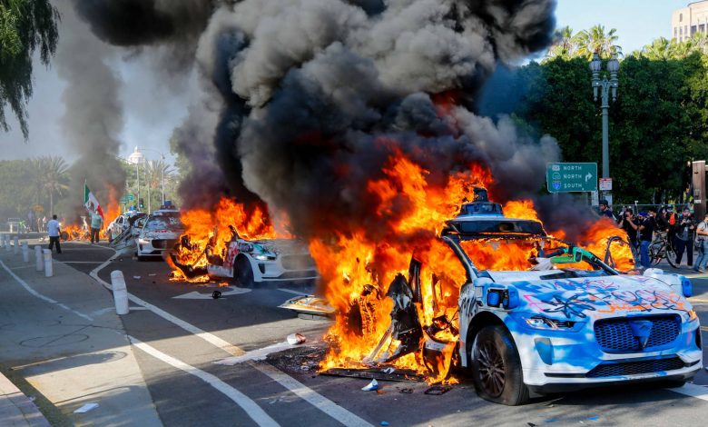 Photos show Waymo vehicles on fire during L.A. protests