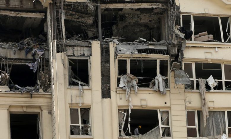 Buildings in residential areas across Tehran are damaged following Israeli strikes on Iran's nuclear and military facilities on June 13, 2025.