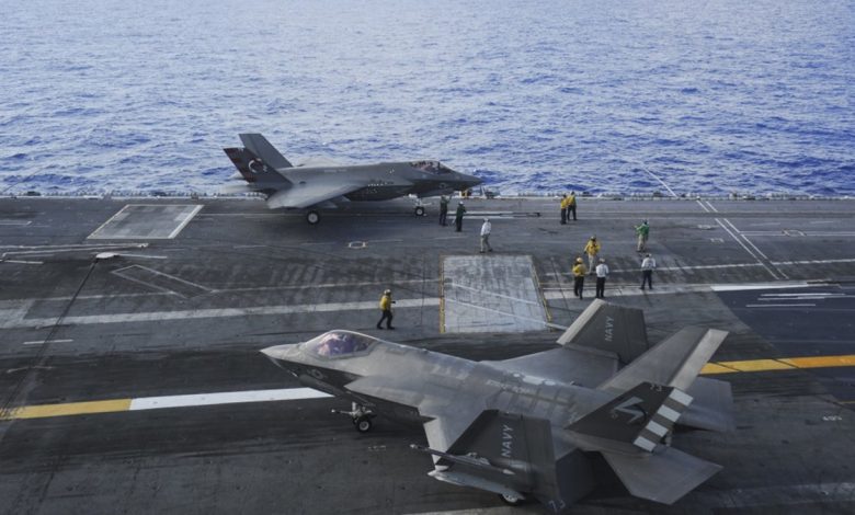 F-35 jets on an aircraft carrier flight deck