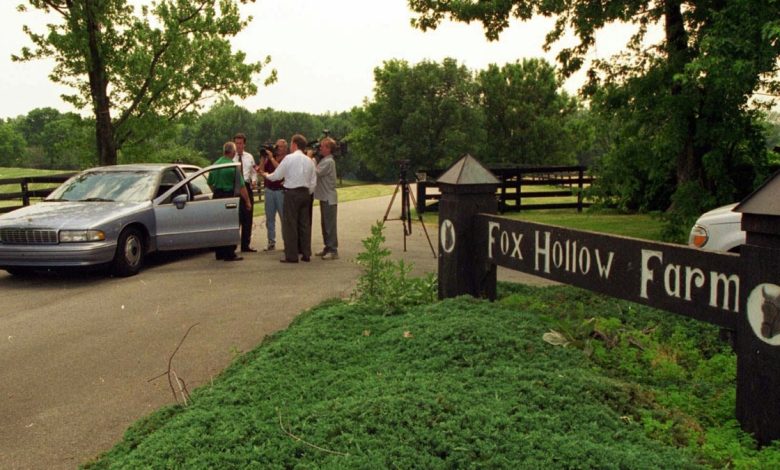 July 2, 1996; Westfield, IN; Television news media interview a police officer outside the entrance of Fox Hollow Farm in Westfield, where human bones were discovered last week. Authorities are still investigating the scene.