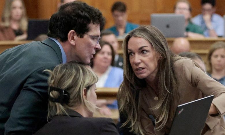 Karen Read confers with defense attorneys Robert Alessi, left, and Elizabeth Little
