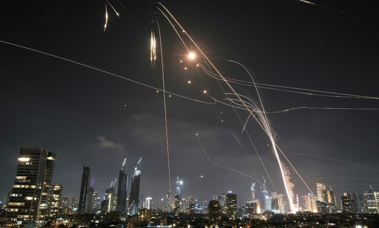 Iran fires 100 missiles at Israel in retaliation, few penetrate defense shield