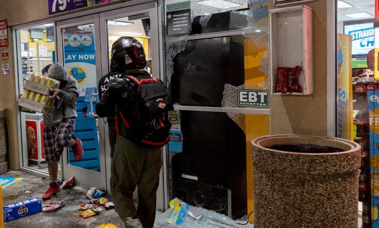 Looters break into a gas station's market place