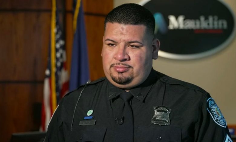 Cpl. Cecilio Reyes of the mauldin police department in police uniform with badge