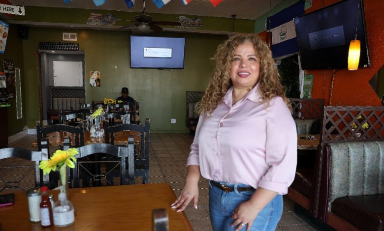 Elizabeth Mendoza, owner of La Ceiba, stands inside her restaurant in Long Beach, California