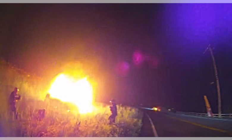 Screenshot of the crash footage showing the vehicle engulfed in flames