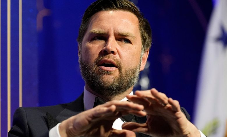 Vance gestures with hands during DC gala