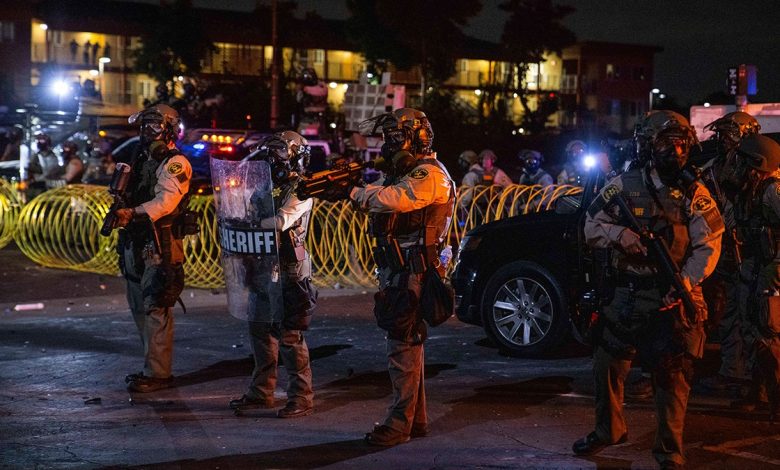 LA deputies with riot shields