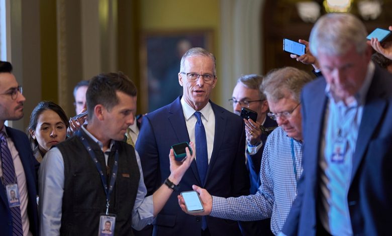 Thune walks with reporters