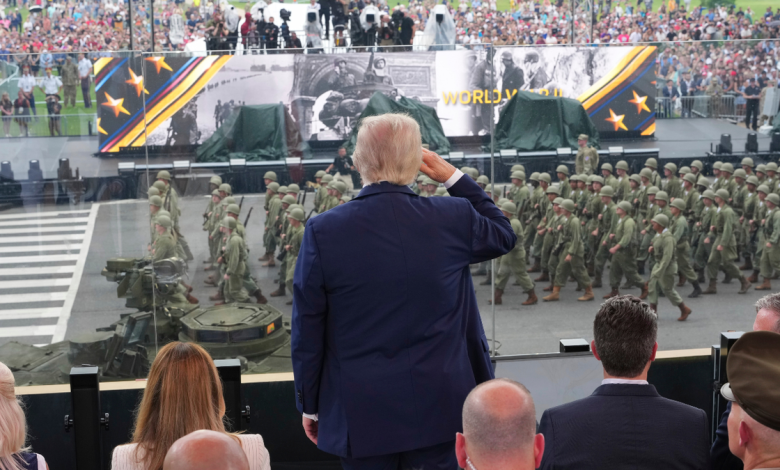 President Donald Trump, center, salutes passing troops during a parade to honor the Army's 250th anniversary, coinciding with Trump's 79th birthday, June 14, 2025, in Washington.