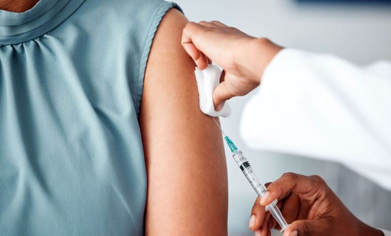 Woman getting vaccine