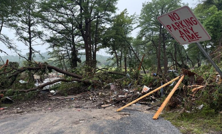 Debris is seen blocking a roadway following the devastating flood in Kerrville, Texas.