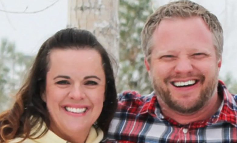 Angela and James Craig smiling in a family portrait.