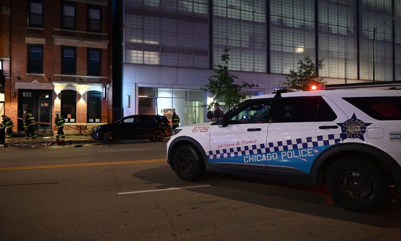 Chicago police cruiser outside scene of shooting