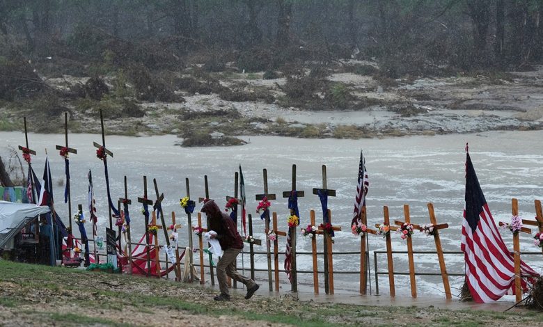 makeshift memorial for flood victims