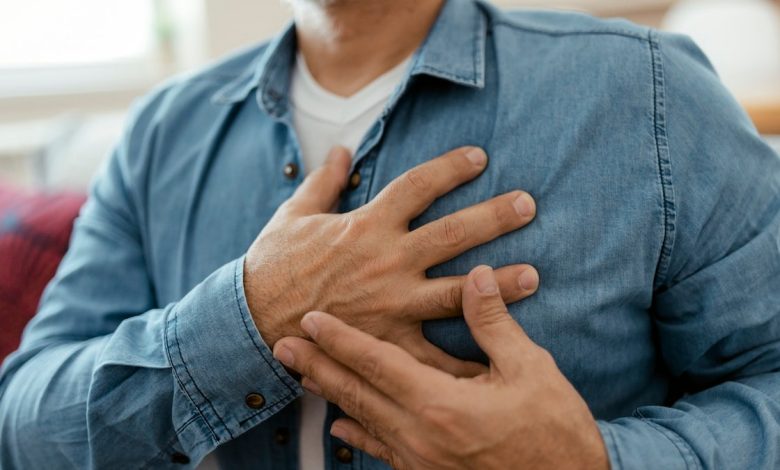 Man holding chest