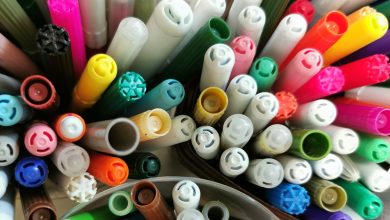 Colorful permanent marker caps view from top