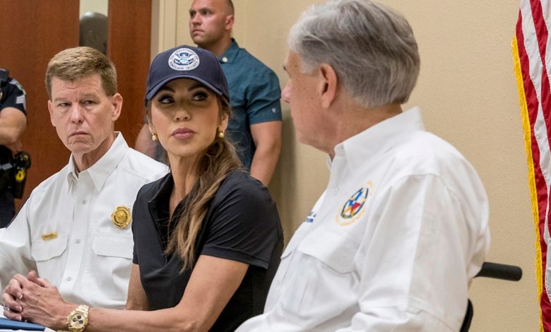 Homeland Security Secretary Kristi Noem and Gov. Greg Abbott, discuss the ongoing efforts for recent flooding along the Guadalupe River during a news conference in Ingram, Texas, on Saturday, July 5, 2025, as Texas Division of Emergency Management Chief, Nim Kidd, left, looks on.