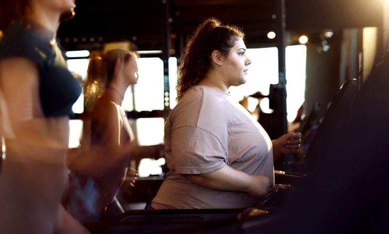 Younger heavier woman exercising